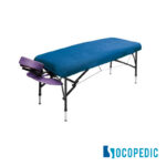 Table de massage avec une housse de protection bleu de marque Socopedic